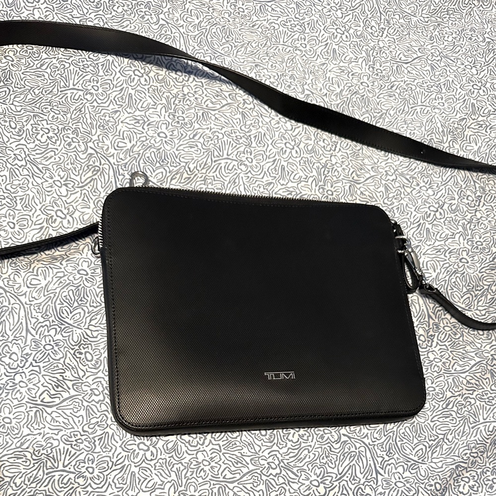 Tumi 8x10 clutch- fits ipad mini. Can also be used as a clutch.